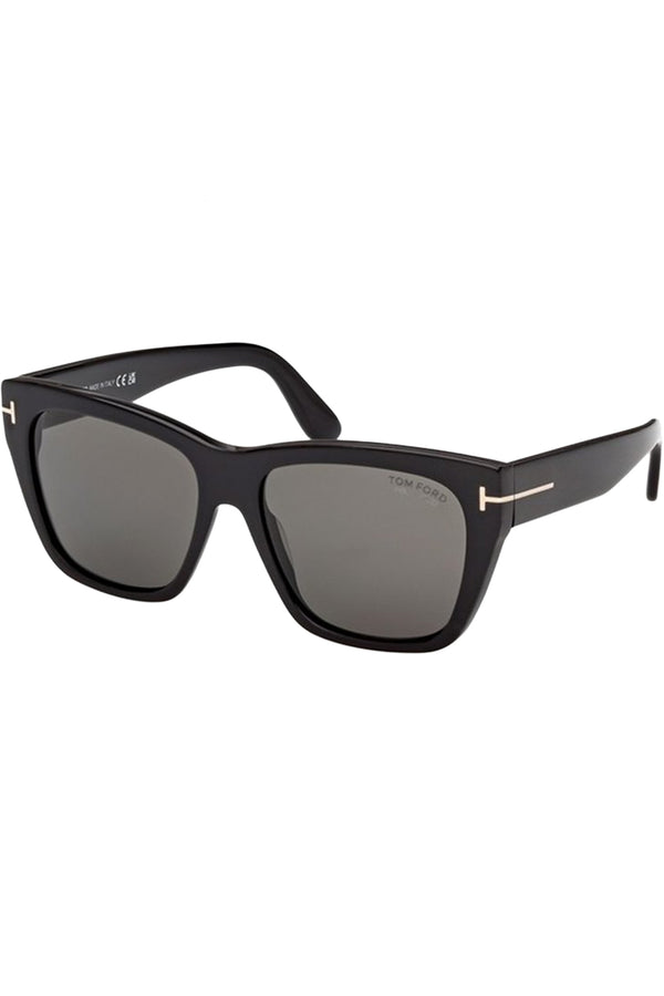 Rotated view of Tom Ford rectangular sunglasses in gray with black frame and metal T details, shown against a plaid white background.