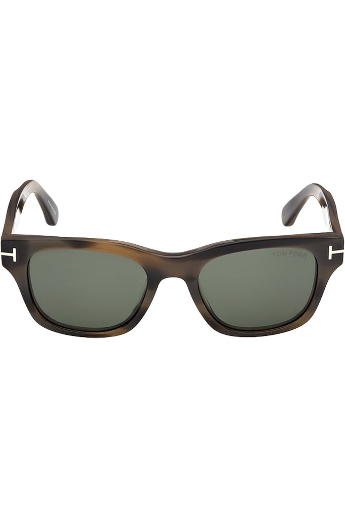 Tom Ford rectangular sunglasses in green with tortoise frame and metal T details, shown against a plaid white background.