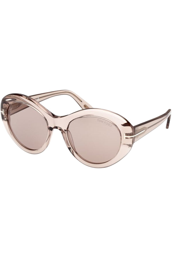 Rotated view of Tom Ford oval sunglasses in pink with translucent pink frame and metal T details, shown against a plaid white background.
