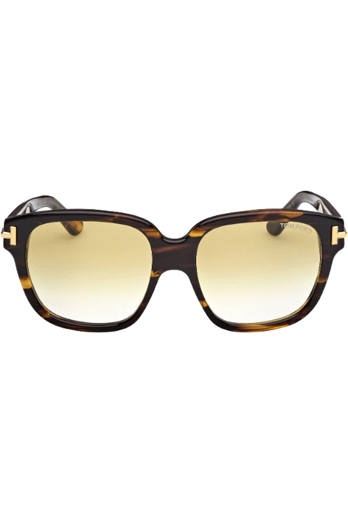 Tom Ford butterfly sunglasses in yellow with tortoise frame and gold T details, shown against a plaid white background.