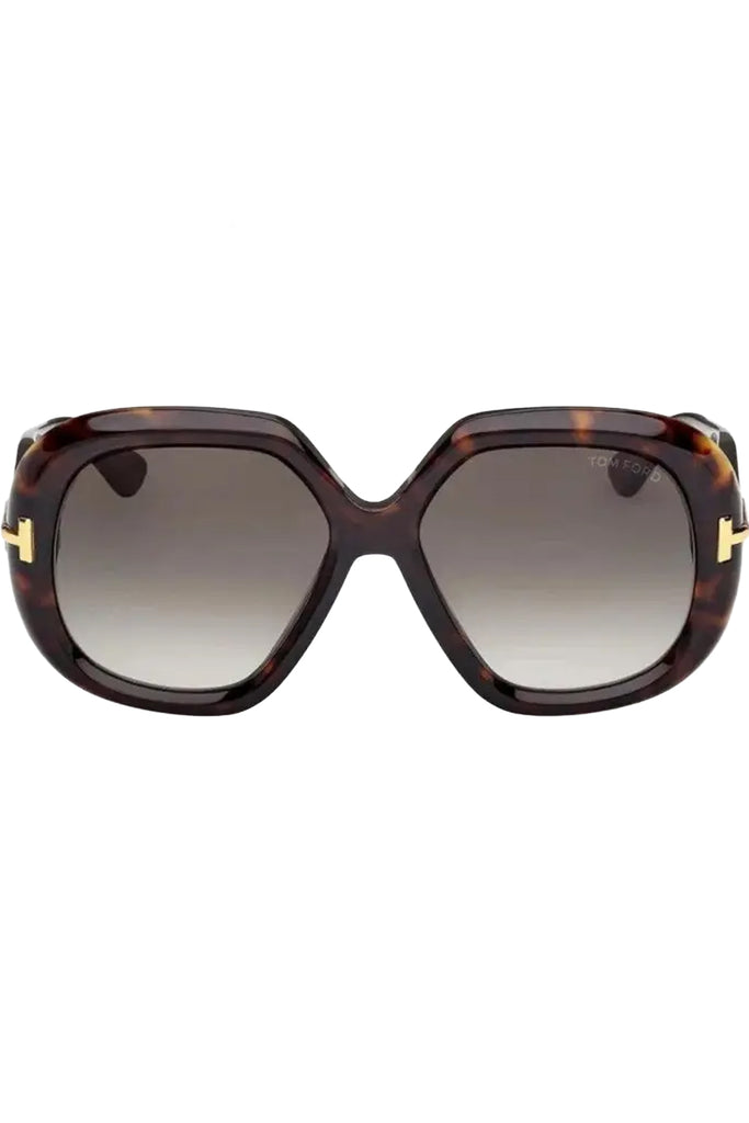 Tom Ford butterfly sunglasses in gray with dark tortoise frame and metal T details, shown against a plaid white background.