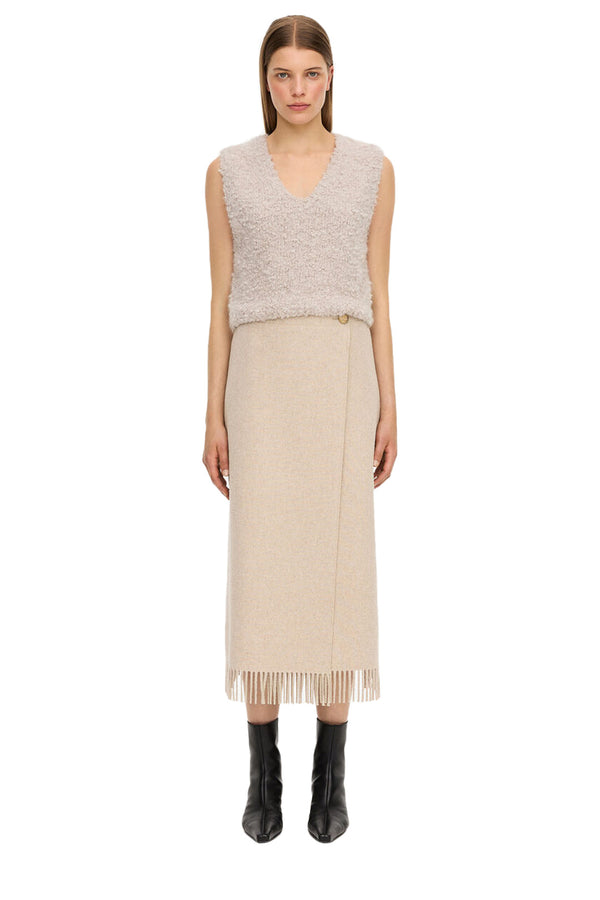 Model wearing the Kelsey knitted cropped Alpaca wool-blend top in beige color from the brand BY MALENE BIRGER