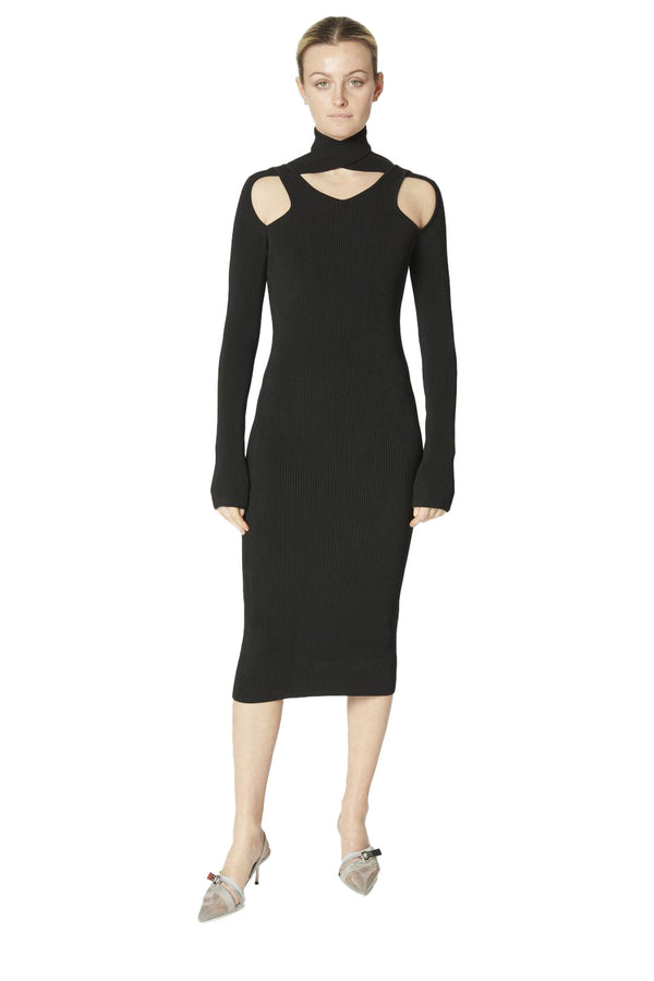 Model wearing the cut-out turtleneck knitted midi dress in black from the brand COPERNI