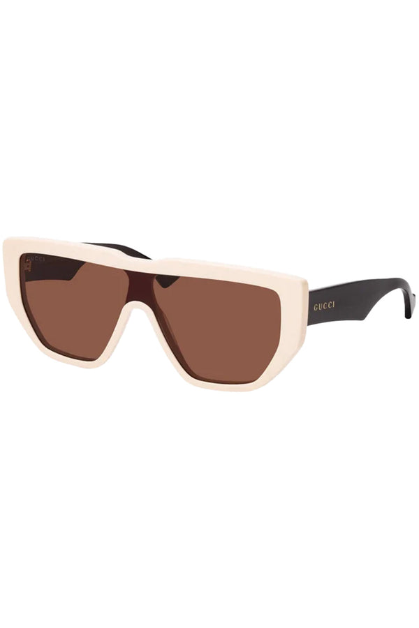 The oversize geometric mask sunglasses in ivory colour and brown lensesfrom the brand GUCCI