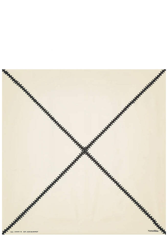 Nanushka scarf in white with four pieces sewn together, shown against a plain white background.