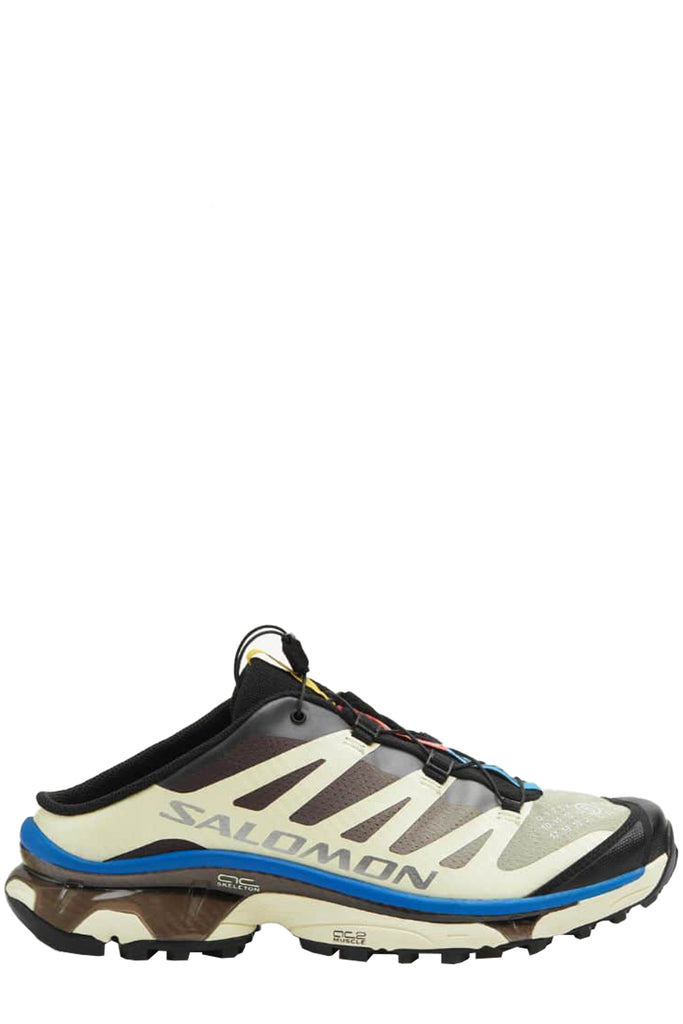 The MM6 X Salomon XT-4 Mules in transparent yellow, shale and lapis blue colour from the brand MM6 X Salomon