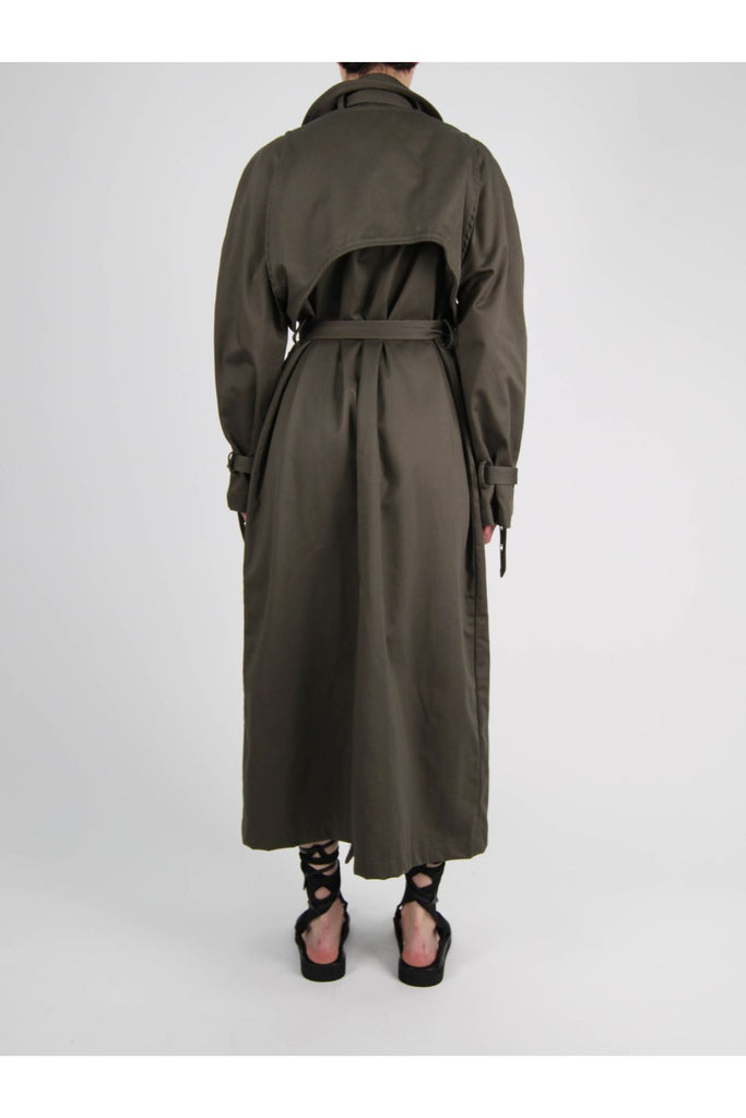 Model wearing the Otto wrap trench coat in tobacco color from the brand OTTOLINGER