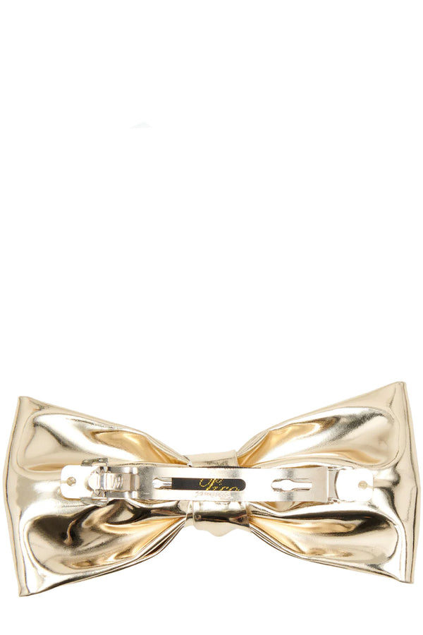 The Kiki bow clip in gold colour from the brand PICO COPENHAGEN