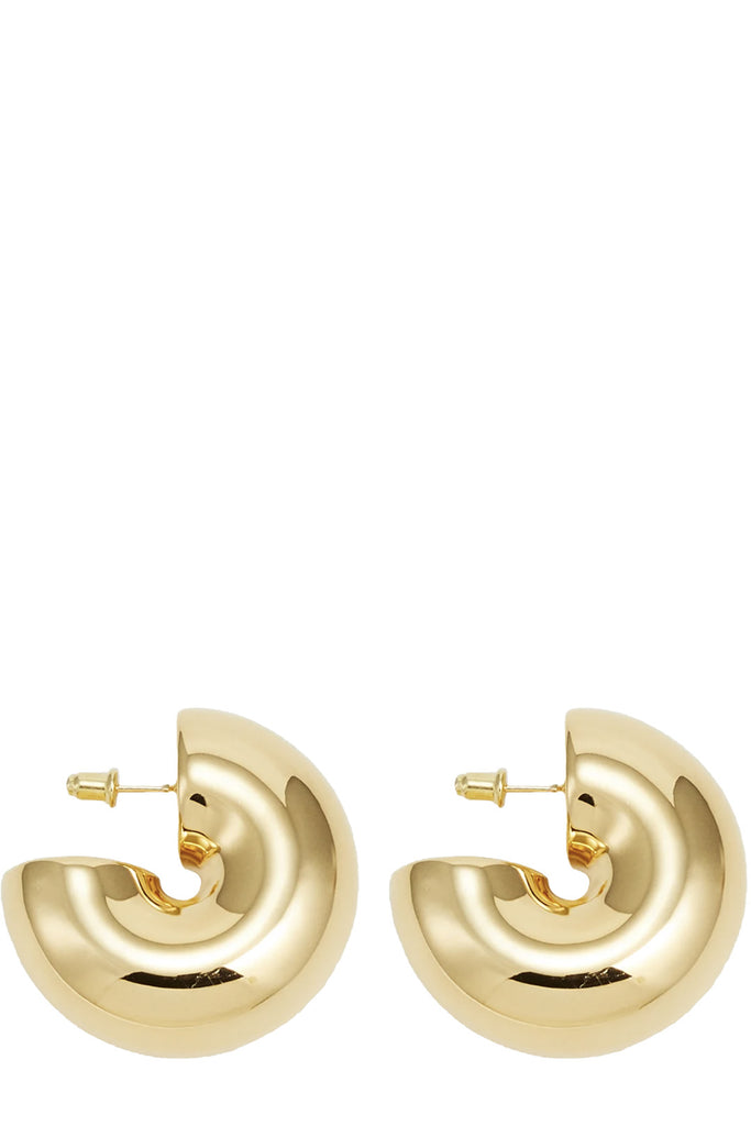 The Beam stud earrings in gold colour from the brand UNCOMMON MATTERS