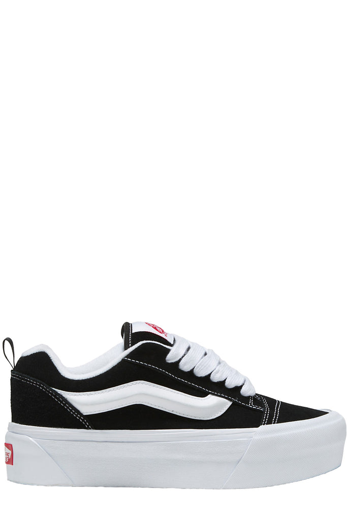 The Knu stack sneakers in black and white colours from the brand VANS